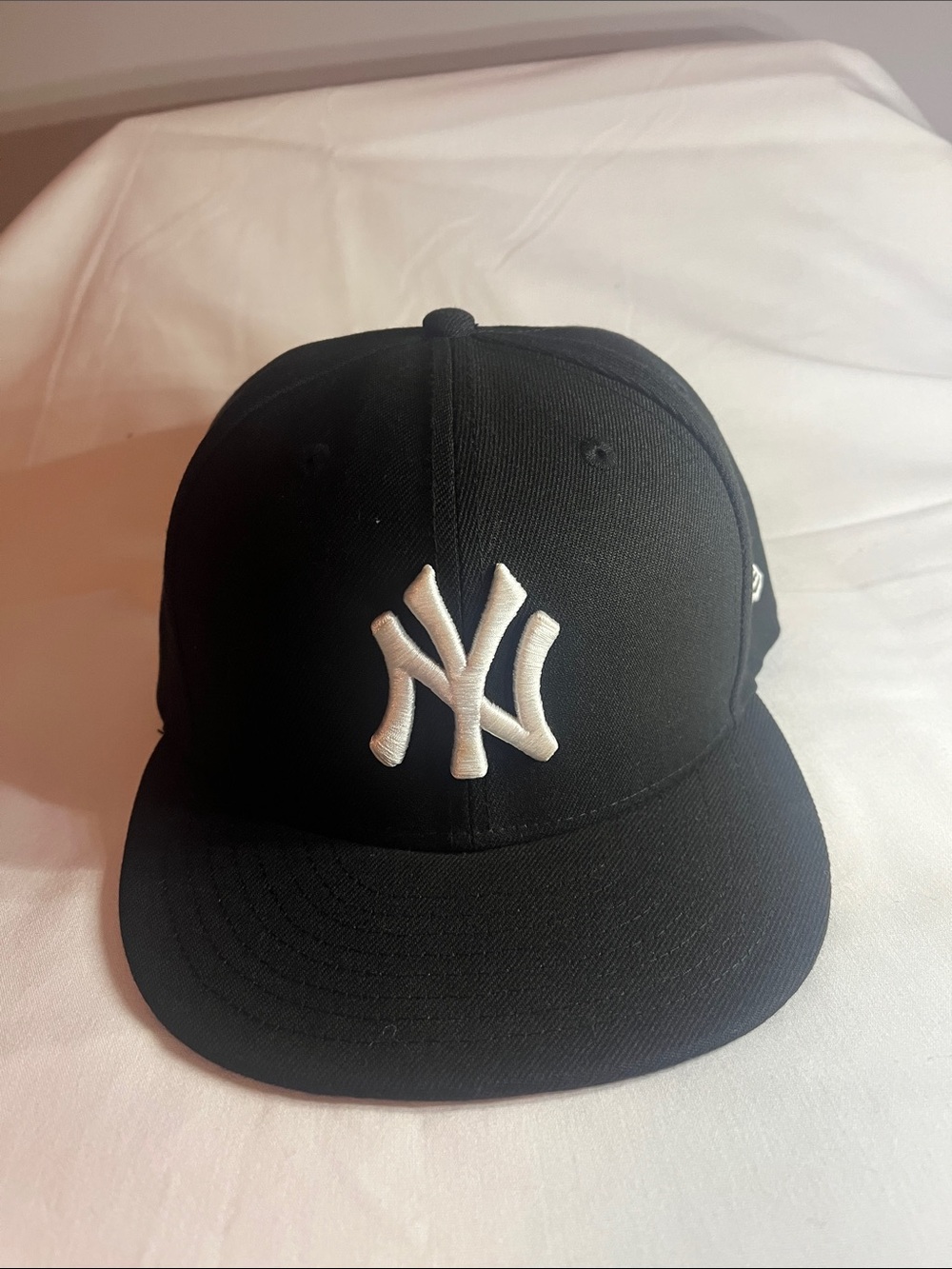New Era Black Baseball Cap with White NY Logo